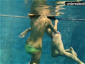 two jaw-dropping amateurs displaying their bods off under water